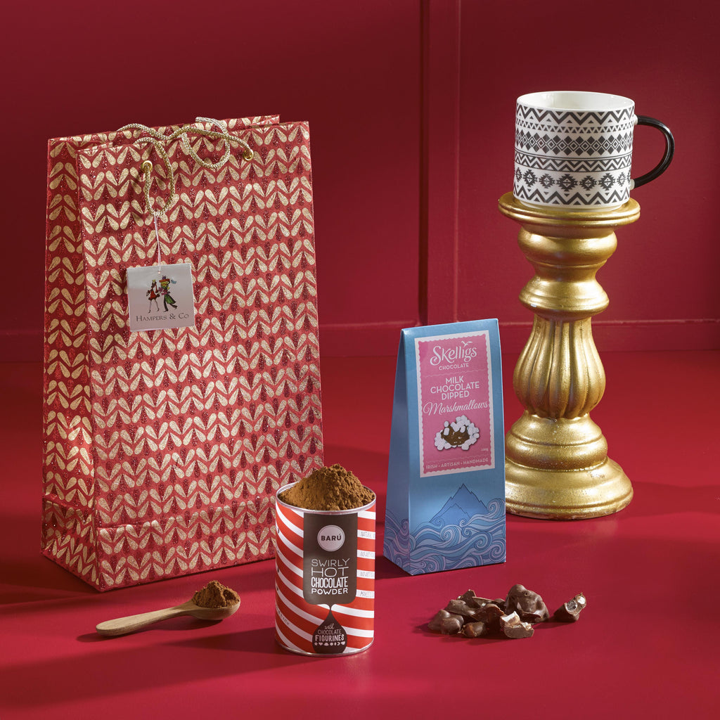 Hug in a Mug image. contains cup, hot chocolate goodies and bag. Christmas gift of Hot Chocolate