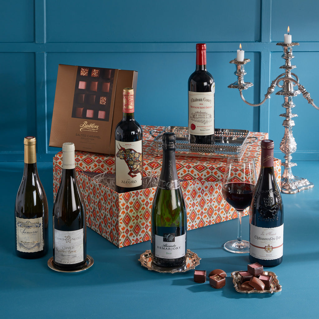 The Six Course Wine Hamper. A great selection of six quality wines accompanied with a box of chocolates.