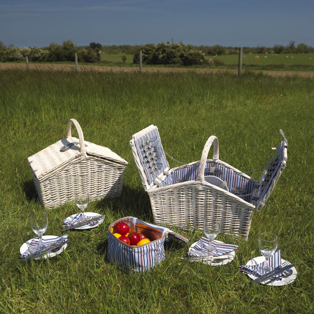 Have a family day out with the Family Picnic Basket. Contains glasses, plates, cutlery, napkins, wine opener, a lined cooler bag. all in a beautiful white wicker picnic basket