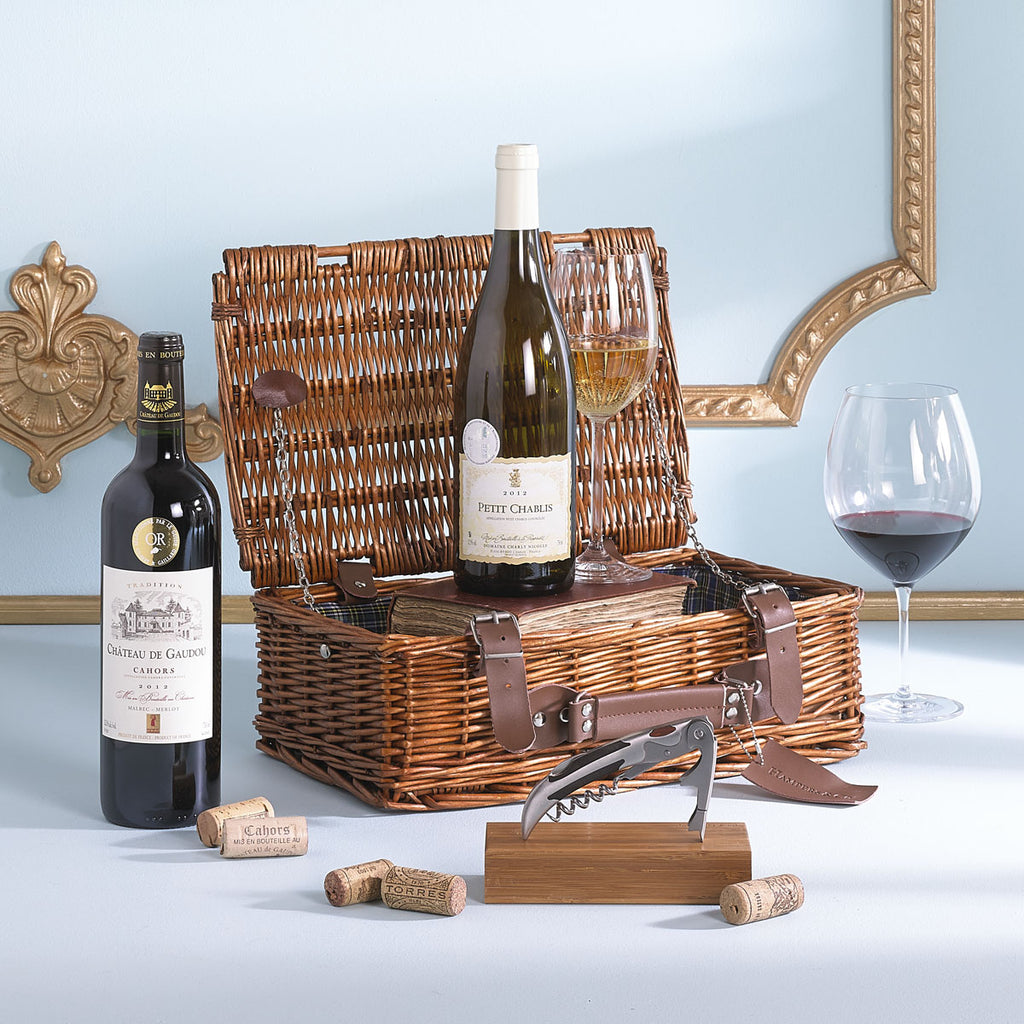 Image containing two award winning wines, accompanied with a traditional wicker picnic basket and Handmade Sommeliers Corkscrew . Wine gift. Corporate Christmas Wine gift. Corporate Gifts Ireland 
